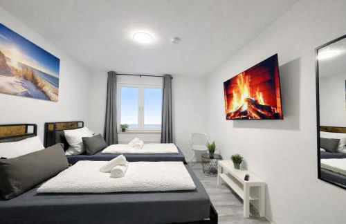 STN Royale Suite - Ferienwohnung mit 4 Schlafzimmer, 8 Big Beds, Parkplatz & Balkon, Highspeed WLAN, Netflix Premium, Zentral zu Audi & Schwarz Gruppe - Foto 13