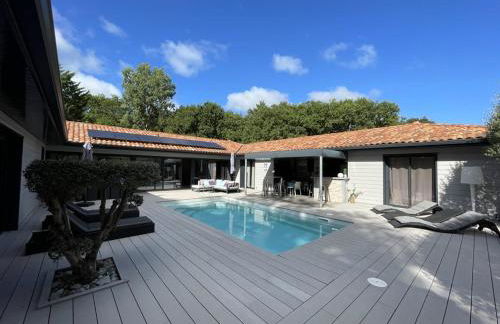 Villa moderne à Soustons avec piscine chauffée, 3 chambres et cuisine extérieure, animaux acceptés - FR-1-379-167 - Foto 1