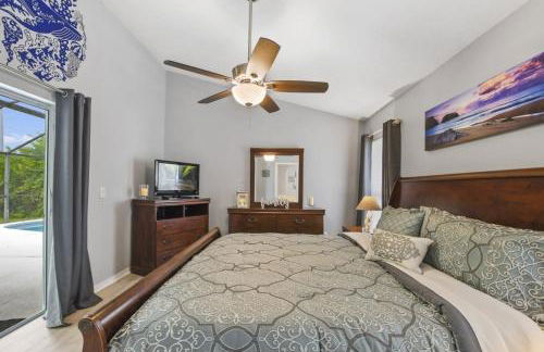 Themed 4BR house pool game room 10 min Disney - Photo 16