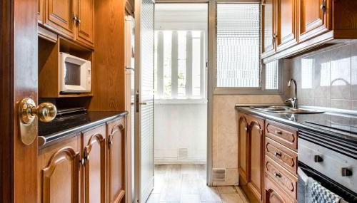 Charming Apartment With Vibrant Accents - Photo 3