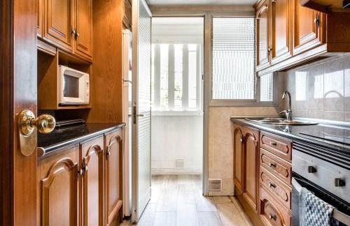 Charming Apartment With Vibrant Accents - Photo 3