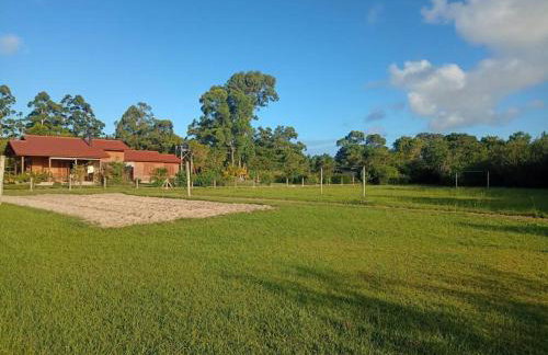 Casa na lagoa do Palmital com acesso à lagoa na propriedade e localizada apenas a 13 km da praia de Atlântida Sul e do Centro de Osório Lugar com Natureza-Wi-Fi 1 cama de casal e um beliche 2 solteiros - Foto 23