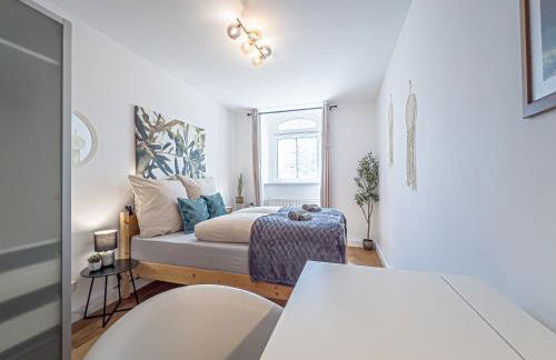 Gemütliche Ferienwohnung mit 2 Schlafzimmern, kostenfreiem Parkplatz, modernem Bad, Küche, Waschmaschine & Trockner - Foto 14