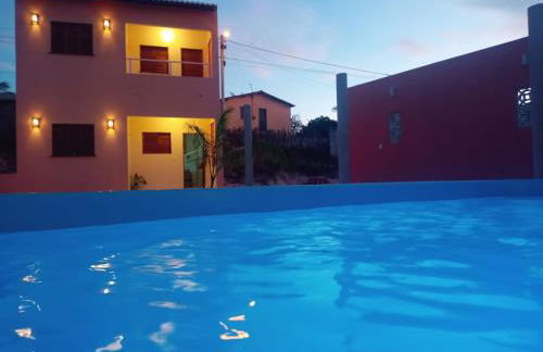 Duplex de 2 quartos com ar condicionado , piscina e estacionamento - Foto 1