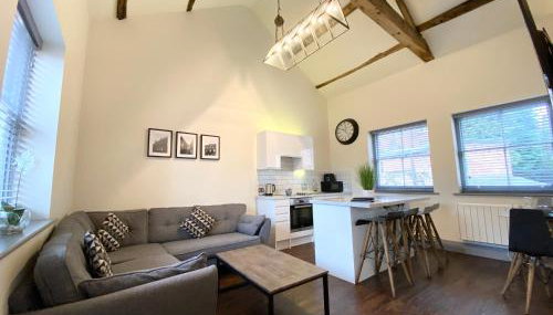 Loft at The Coach House Apartments - Foto 2