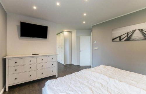 Modernes Holzhaus mit traumhaftem Deichblick - Foto 20