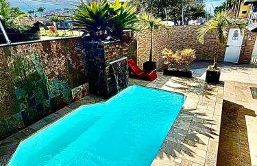 Casa Pé na Areia com Piscina Climatizada - Photo 1