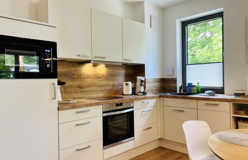 Ferienwohnung Strandkorb & Mee h r Parkvillen Carlota und Candela Baabe - Photo 9