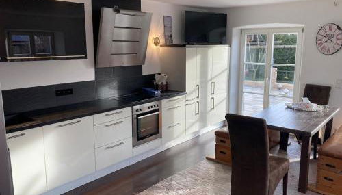 Lichtdurchflutete 65m2 Einliegerwohnung mit großer Südterrasse und Komfort-Bad - Foto 2