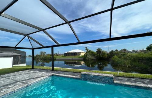 Newly built Villa Ballerina with heated pool and incredible view into beautiful Arrowheadcanal - Photo 9
