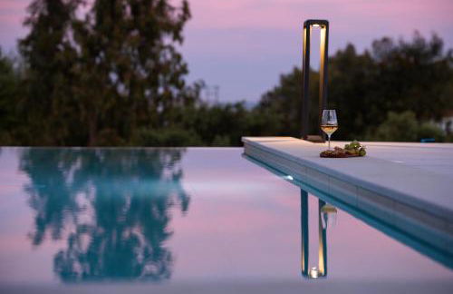 Reveli Suites - Photo 23