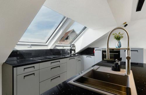 Moderne offene Dachgeschoßwohnung - Foto 8