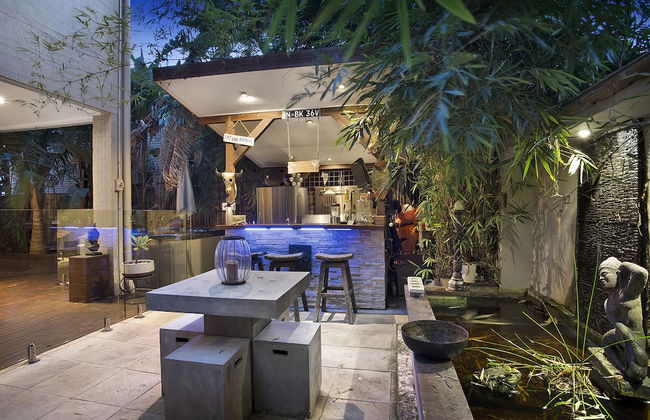 Resort Style Home near Airport & CBD - Photo 19