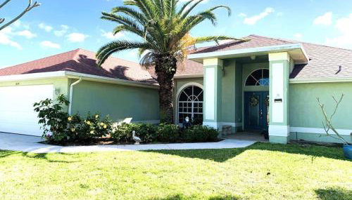 Relax with nature in our Waterfront 4 bedroom -HEATED POOL HOME-KING BED - Foto 3, Garden view