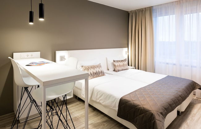 Valo Hotel City - Photo 4