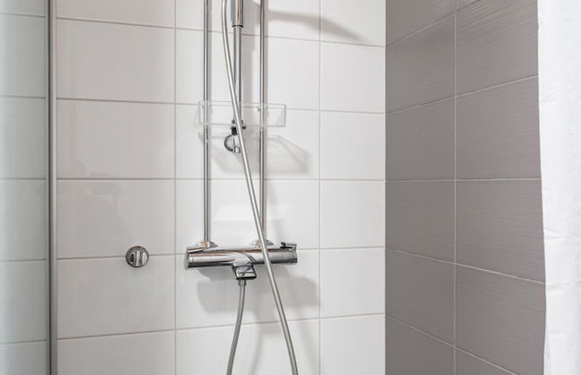 1BR & Balcony next to Railway Station in Downtown - Photo 16