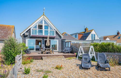 Pebble Paradise Beachfront Family Getaway - Foto 32