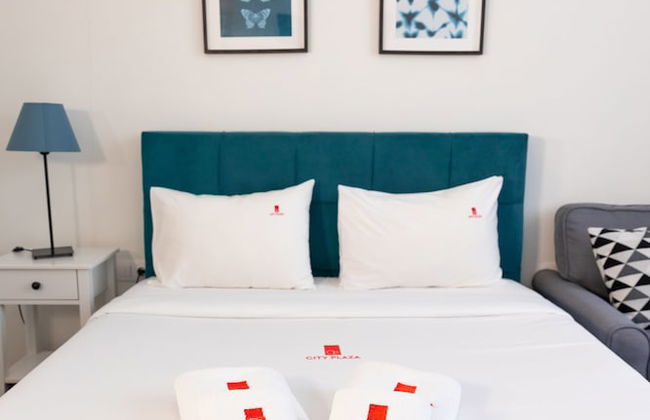 City Plaza Apartments & Rooms - Foto 17