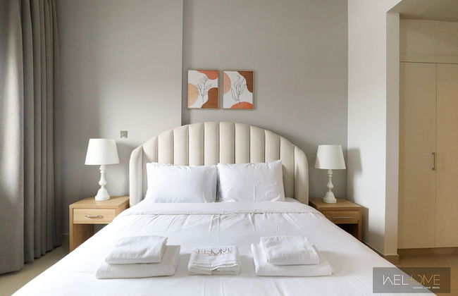 WelHome - Prime 1BR Apartment at Oia Residence - Photo 9