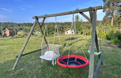 Wczasy Pod Sosnami domek z kominkiem - Foto 15