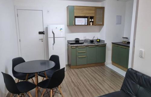 Ap10 Prático, confortável com wifi, piscina, rooftoop e academia em frente ao Metrô - Photo 4