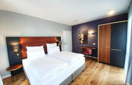 Erasmus Lodge - Ferienwohnungen zum Wohlfühlen - Foto 24