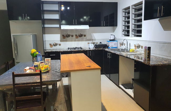 Master Bedroom with Shared Kitchen - Photo 1