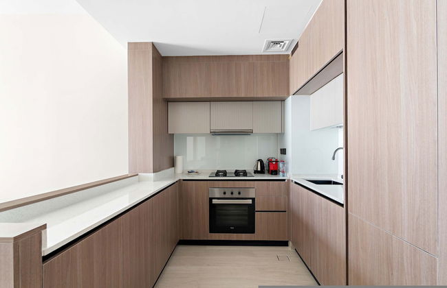 New 1-bedroom in Prime Gardens With Pool and gym - Photo 11