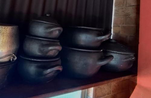 Casa Espaço Sara Piscina com total privacidade, área gourmet completa com churrasqueira fogão a lenha, a 5min do centro e do parque das águas - Foto 39