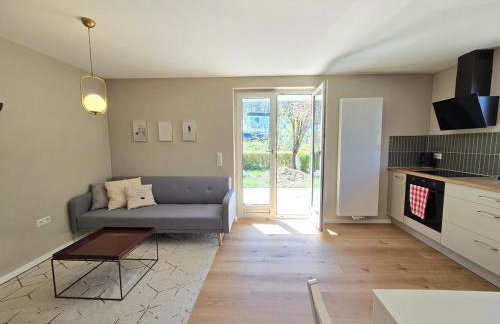 Charmante 3-Schlafzimmer Wohnung mit Garten - Foto 1