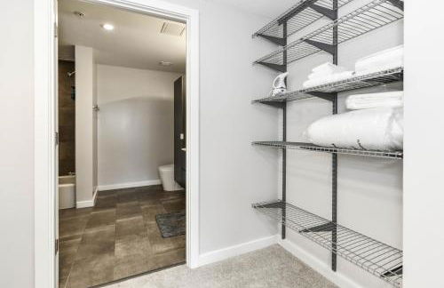 Comfy 2BR Oasis with Scenic Rooftop & Gym - Photo 51