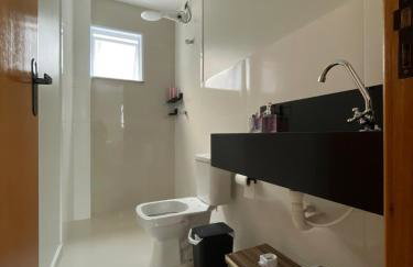 Apartamento em Poços - Varanda com Churrasqueira - Foto 13