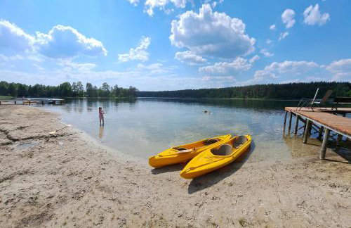 Domki przy jeziorze z prywatną plażą w Borach Tucholskich Pensjonat Alicja wczasy z dziećmi nowe luksusowe domki na skraju jeziora i lasu - Foto 14