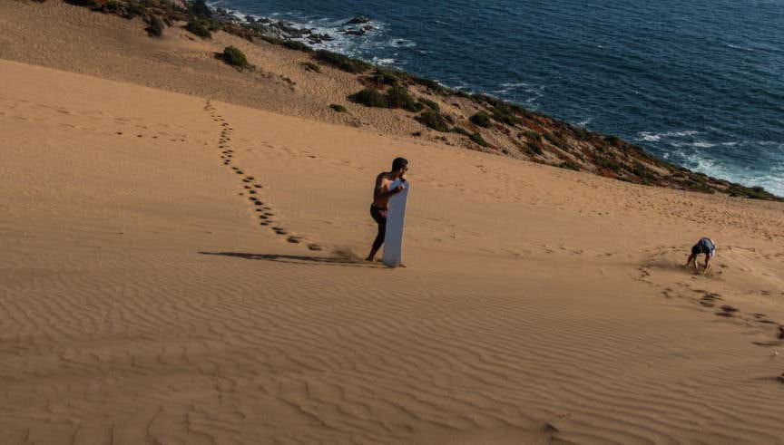 Sandboarding in the Concon Dunes