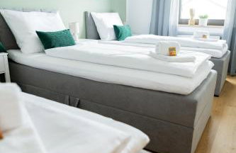 C4S -COME4STAY -InnHarmony- Stilvoll eingerichtetes Apartment für bis zu 8 Personen - Hochwertige Betten I voll ausgestattete Küche I Balkon I Badezimmer I WLAN I Smart TV - Foto 20