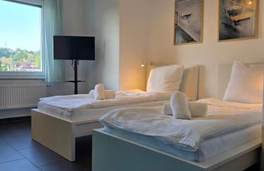 APARTMENT PD23 ALTE FEUERWACHE I Ganze Wohnung I 5 Einzelbetten I 3 Zimmer I 3min CityHospital I 50m Supermarkt I Küche I SmartTV - Foto 5