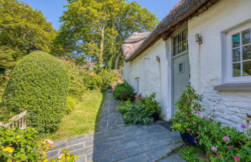 Putsborough Manor 3 Self Catering Cottages with Beach a short walk, dog friendly all year, On site Tennis, Play Area, Paddock, Spa baths, BBQ, Private Gardens, Superfast WIFI - Photo 8