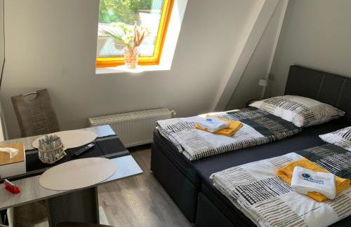 -Fewo Benz- Exklusive Ferienwohnung im Stadtzentrum von Wittenberge Modernes Ambiente, 3 Einzelzimmer für bis zu 6 Gäste - voll ausgestattet mit Waipu-TV und High-Speed-WLAN Bettwäsche und Handtücher inklusive! - Foto 30