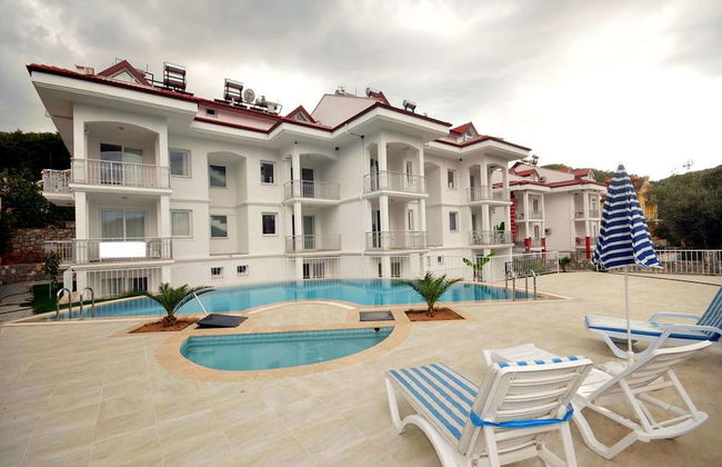 Infinity Olympia Apartments - Photo 1