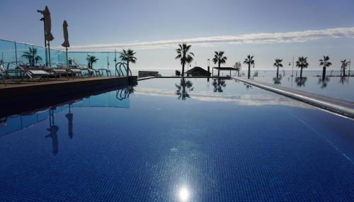 Super zeezicht in eerste lijn met verwarmd zwembad en fitness - Foto 5, sunbed