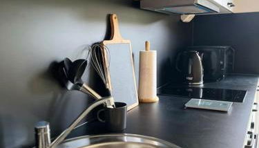 Greenroom Apartment - Photo 3, stove