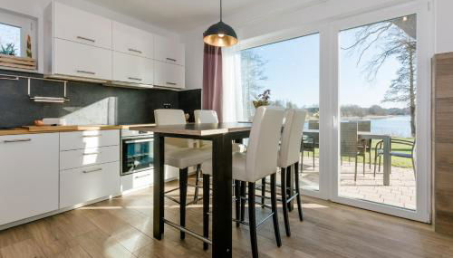 5 Sterne Ferienhaus direkt am See mit Sauna-Kamin-Garten - Foto 5