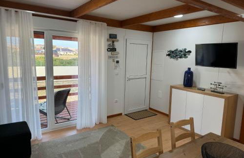 Acolhedora casa de férias T2 com espaço exterior - Foto 12