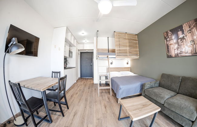 TopFloor Apartments - Photo 5