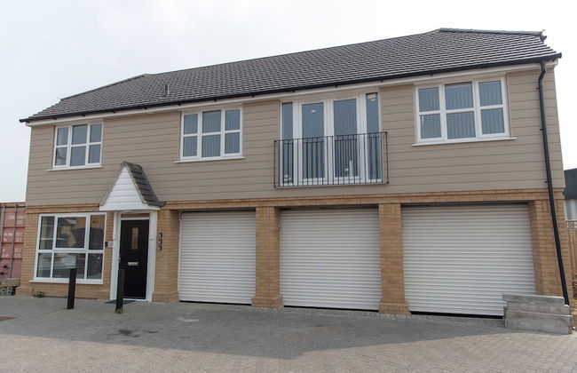 The Coach House by Riis Property - Photo 1