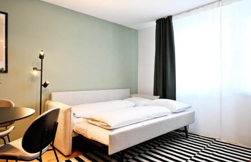 Rosengarten Apartments Fürth, Moderne Serviced Apartments in Citylage, ganze Ferienwohnung 50 m2, nahe Nürnberg, Metro, Sauna, Frühstück & Parkplatz - Foto 7