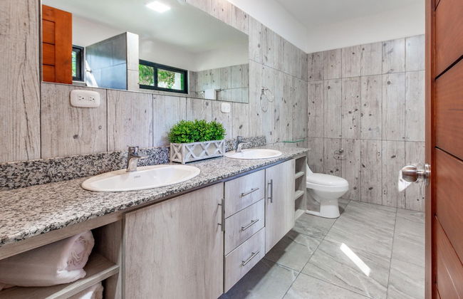 Ultramodern Townhome with an Inviting Coastal Design and Lush Outdoor Oasis with a Private Pool - Photo 20