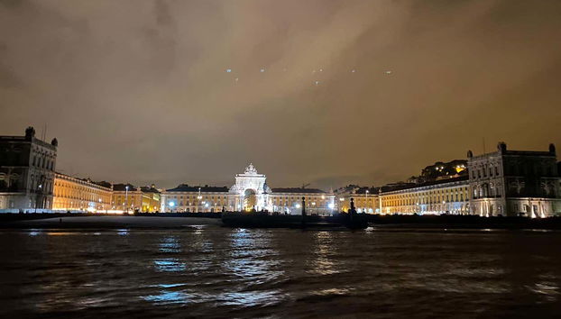 Sailing down the Tagus at dusk