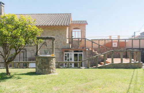 Casa con jardín y gran terraza con vistas al mar - Foto 1