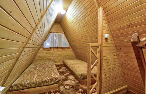 Ośrodek Wypoczynkowy Puszczyk Wolnostojące Domki Sosnowe z zadaszonym tarasem - Foto 6